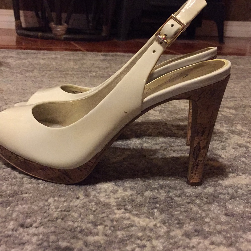 White Patent Leather and cork heels.